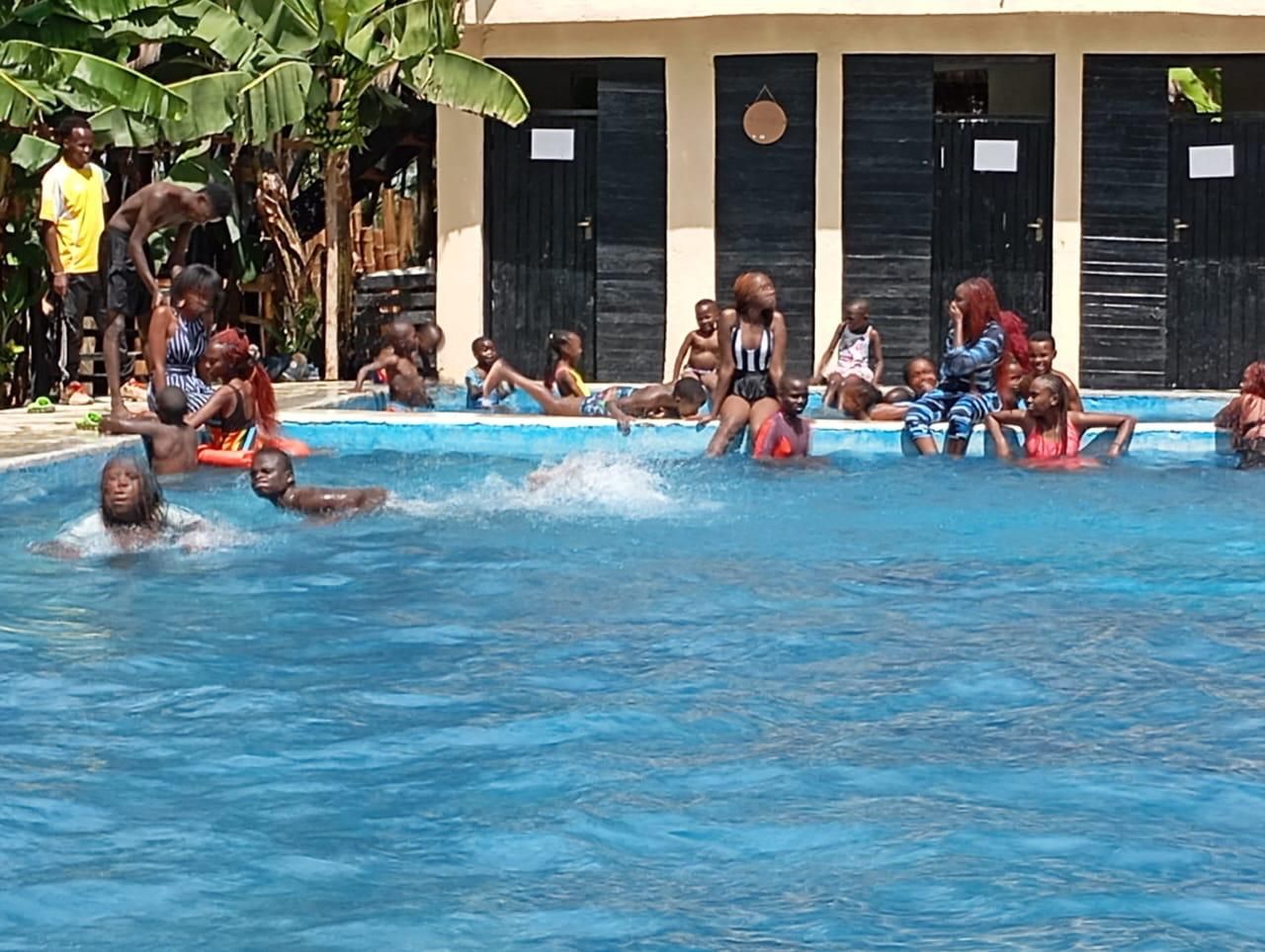 Children enjoying a fun day at the swimming pool