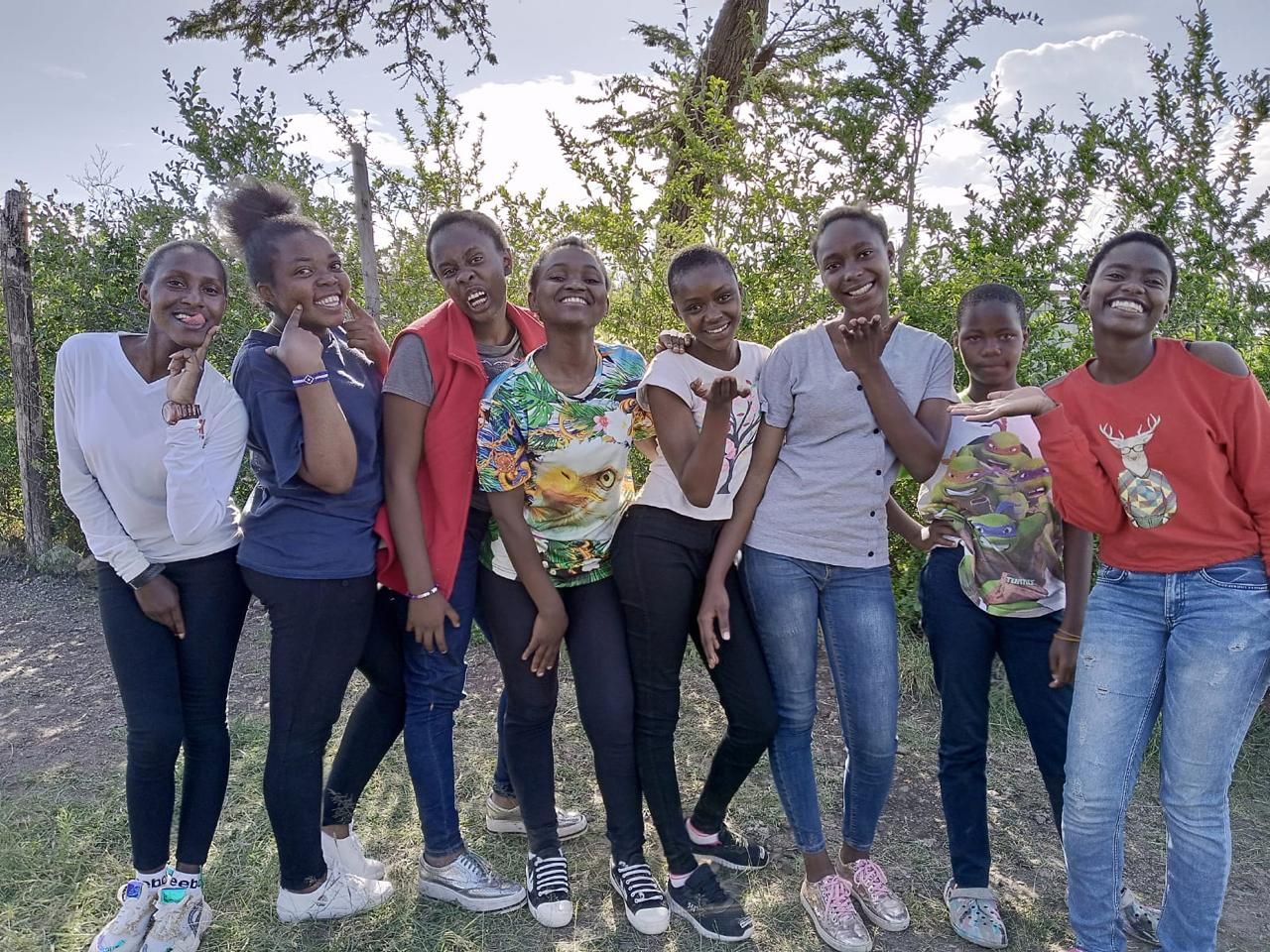 Young women posing together outdoors